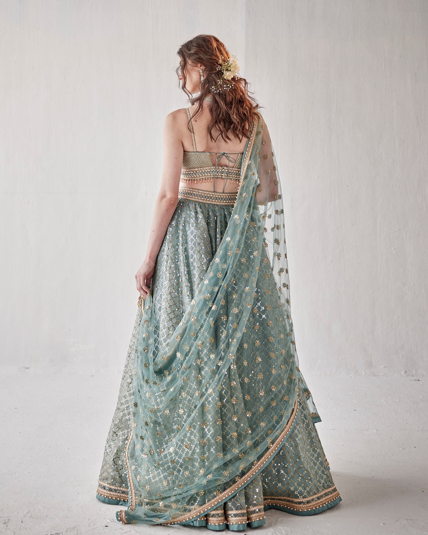 Konya blue organza lehenga with sequin embroidery