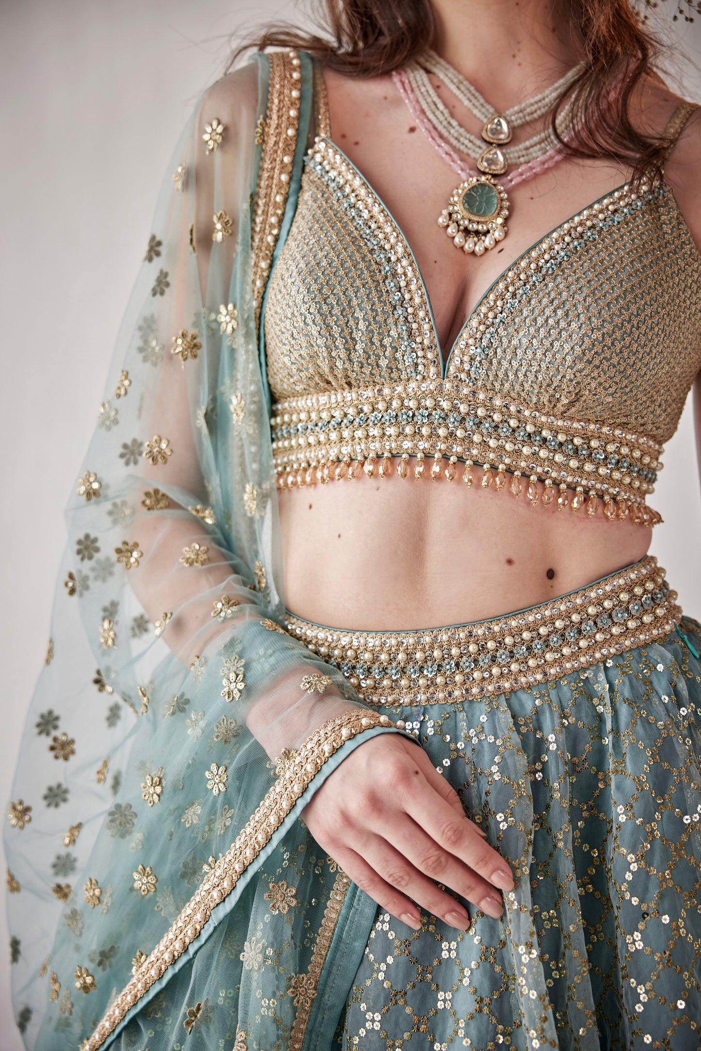 Konya blue organza lehenga with sequin embroidery