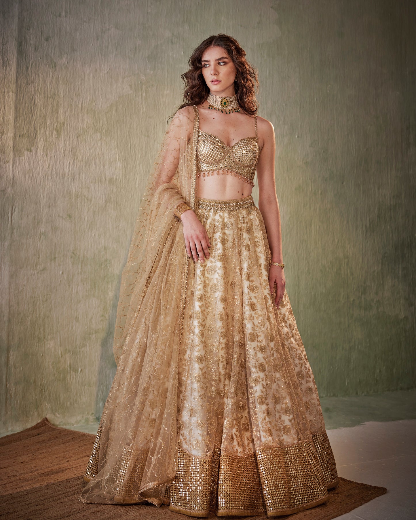 Ivory gold embroidered tulle lehenga