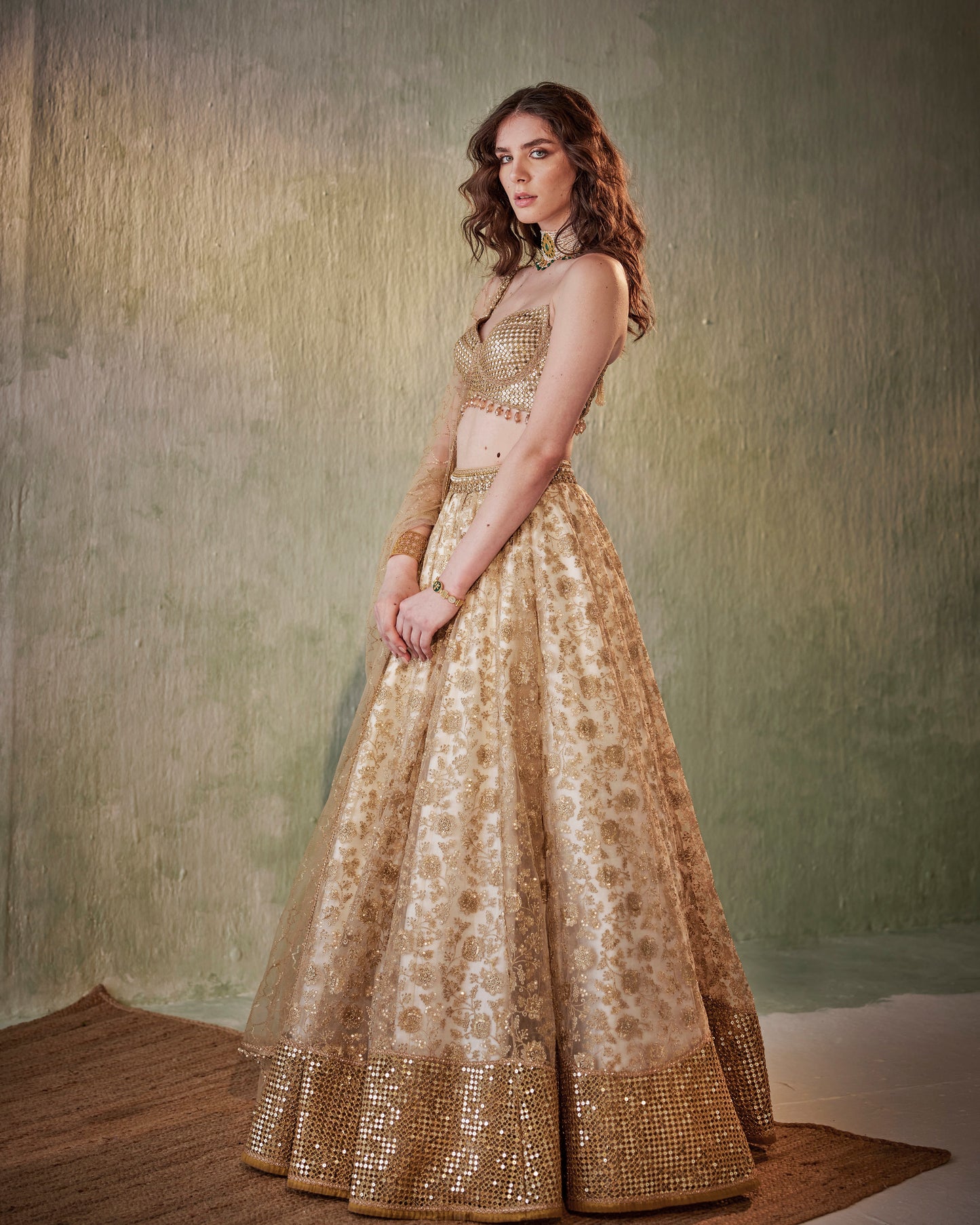 Ivory gold embroidered tulle lehenga