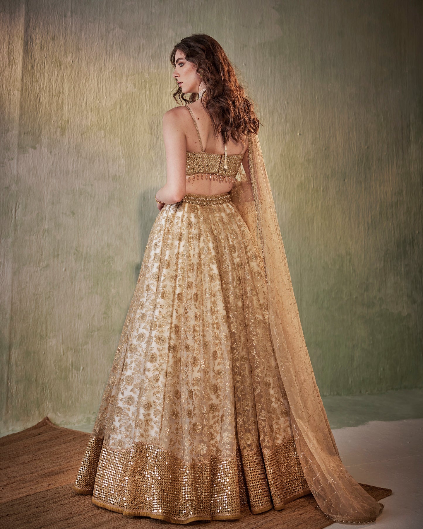 Ivory gold embroidered tulle lehenga