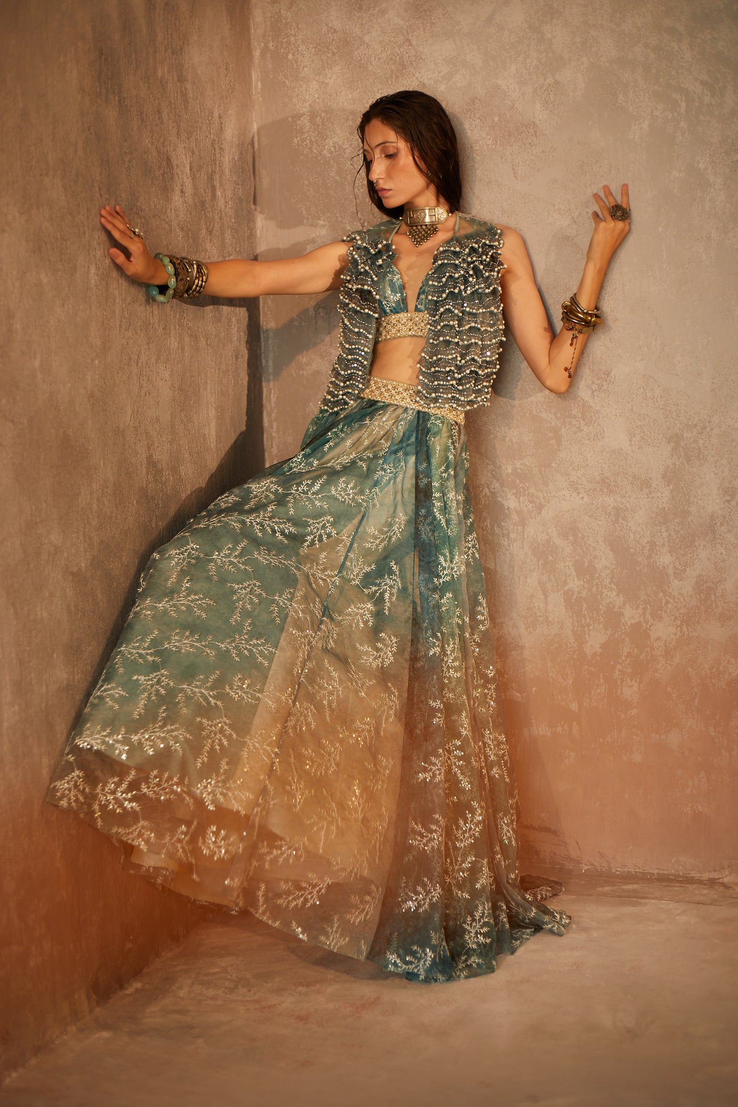 Lake blue organza lehenga with embroidered gilet