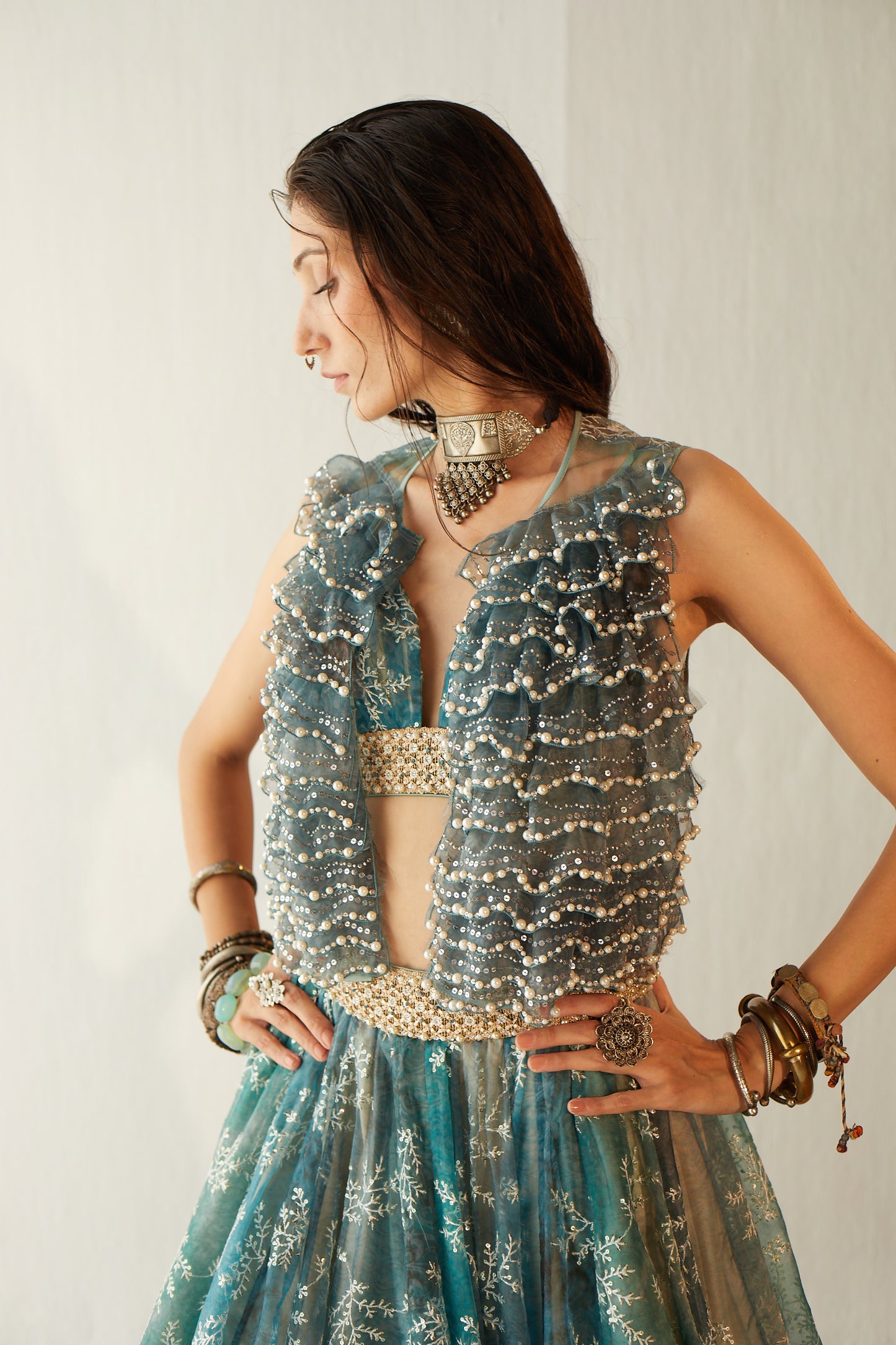 Lake blue organza lehenga with embroidered gilet