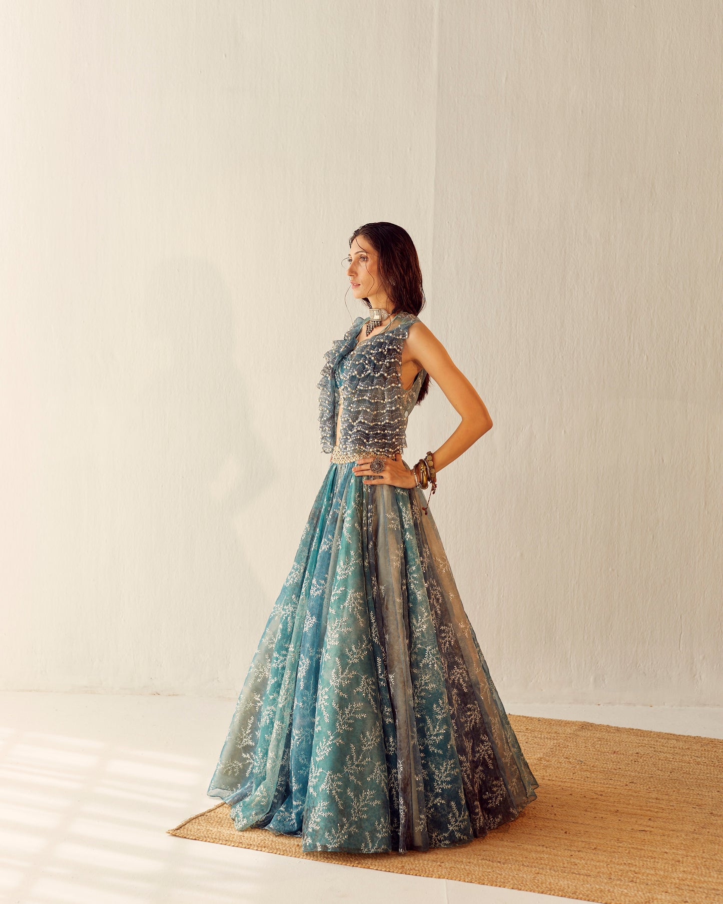 Lake blue organza lehenga with embroidered gilet