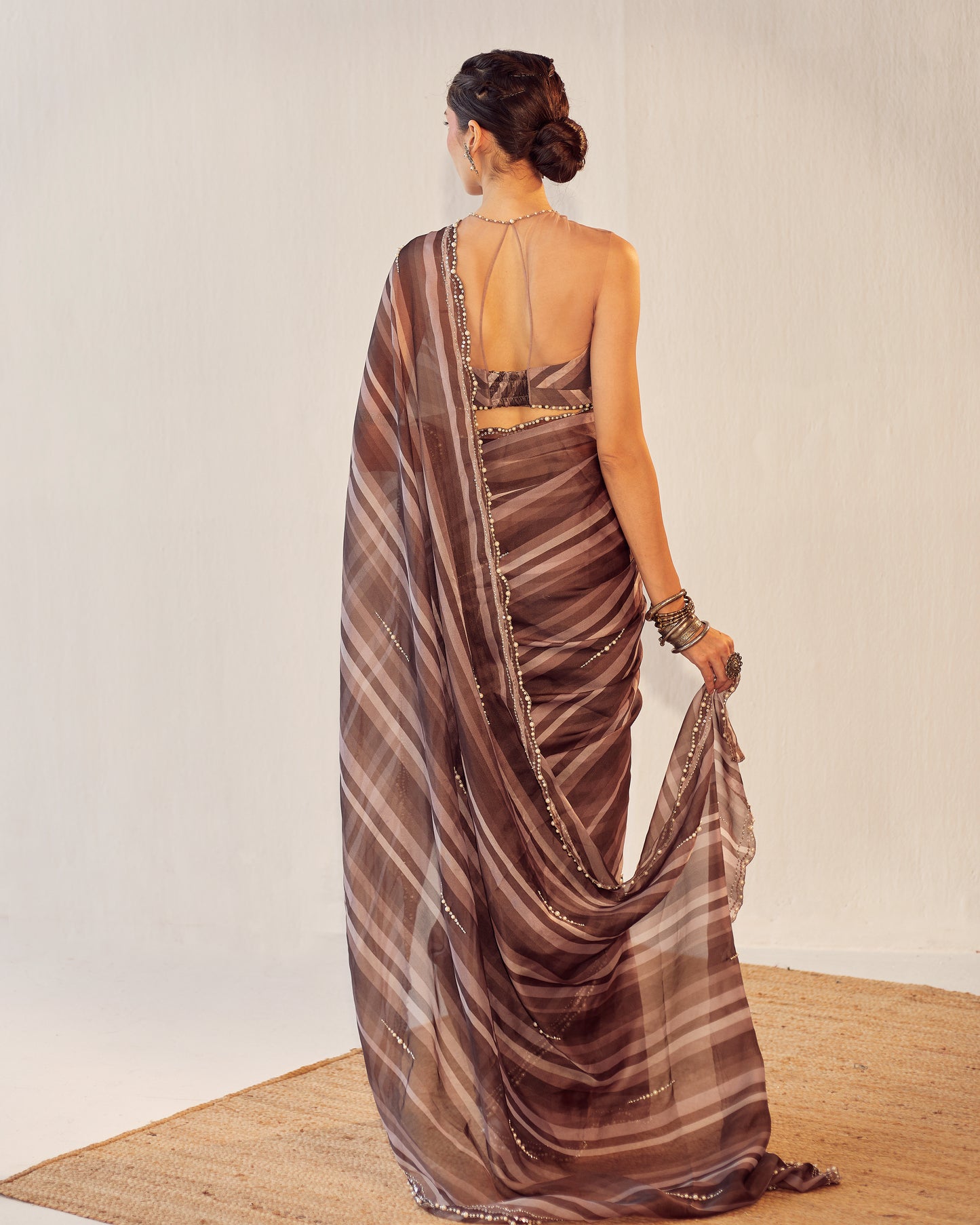 Organza saree with colored floral blouse