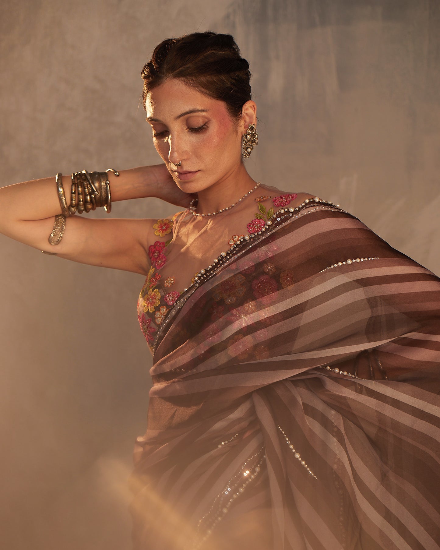 Organza saree with colored floral blouse