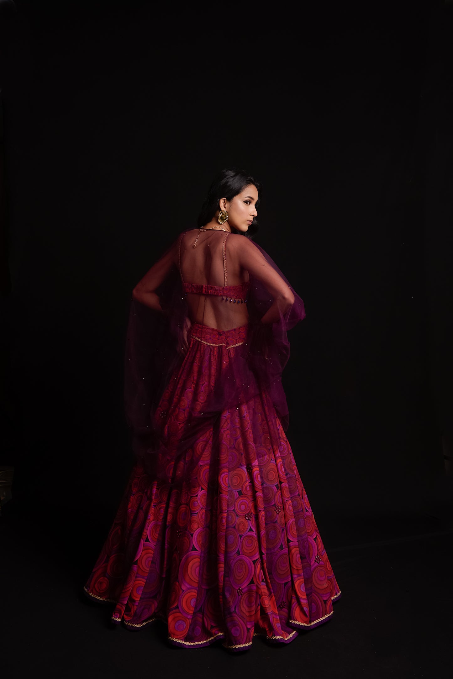 Multi colour orbit print velvet lehenga
