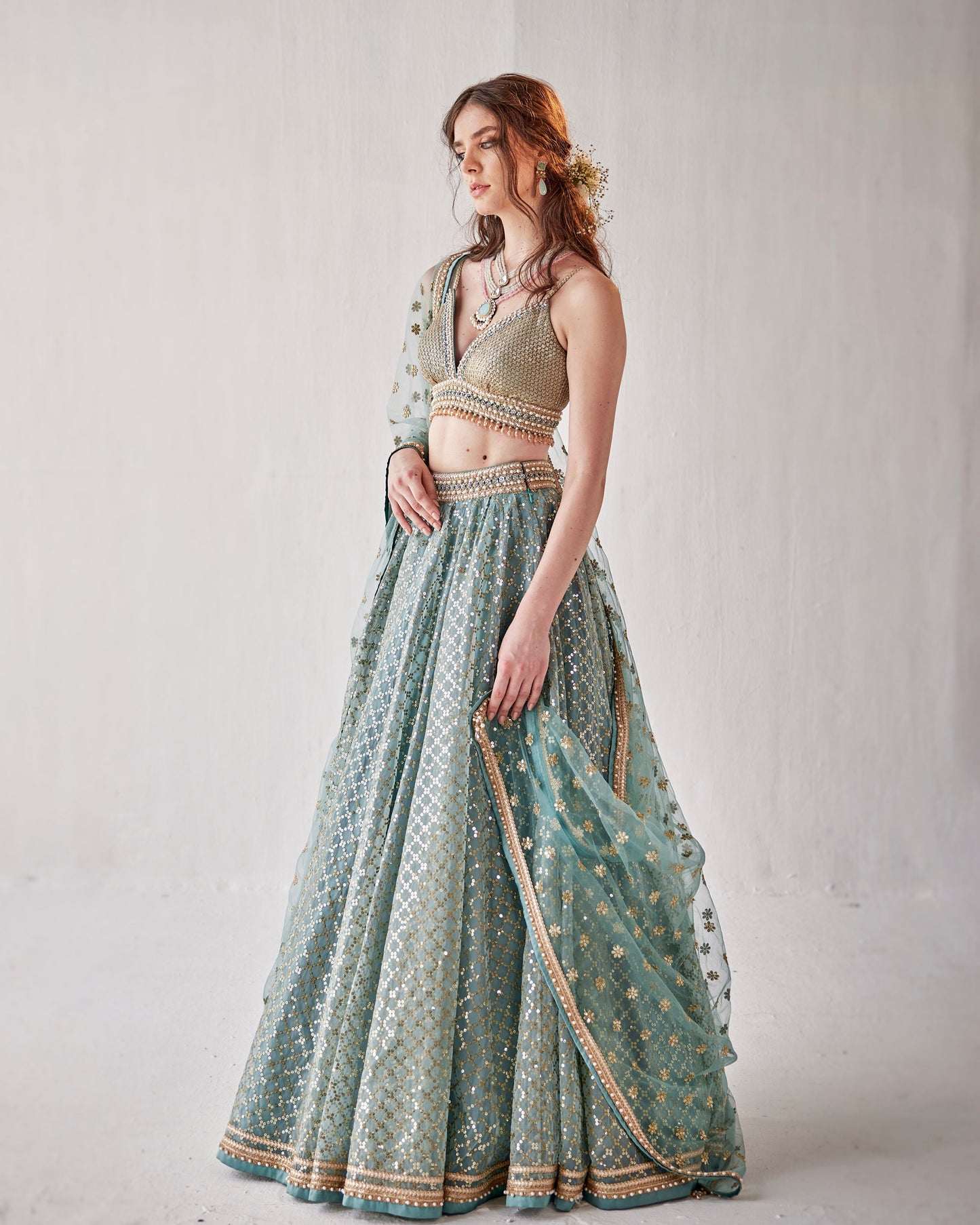 Konya blue organza lehenga with sequin embroidery