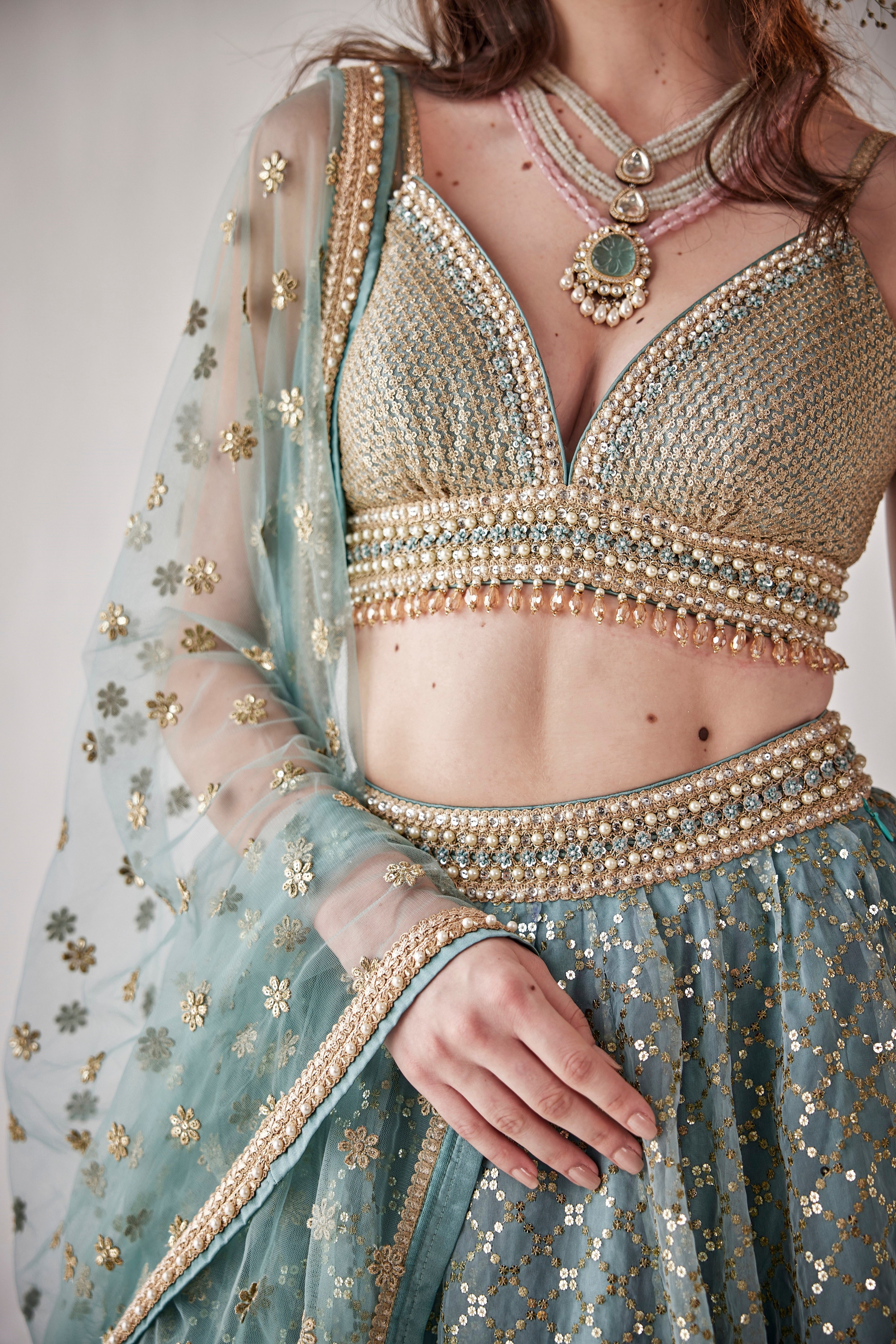Konya blue organza lehenga with sequin embroidery