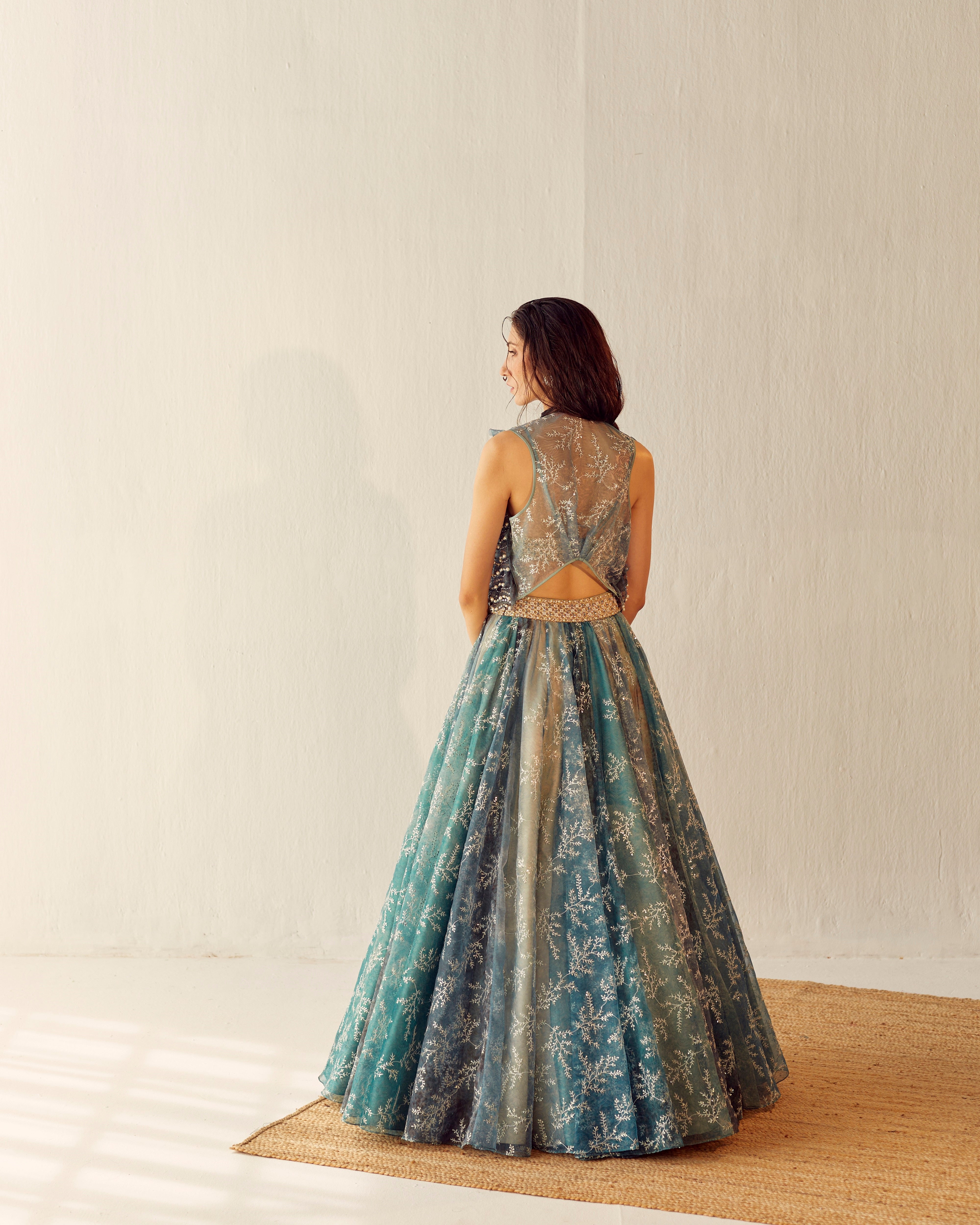 Lake blue organza lehenga with embroidered gilet