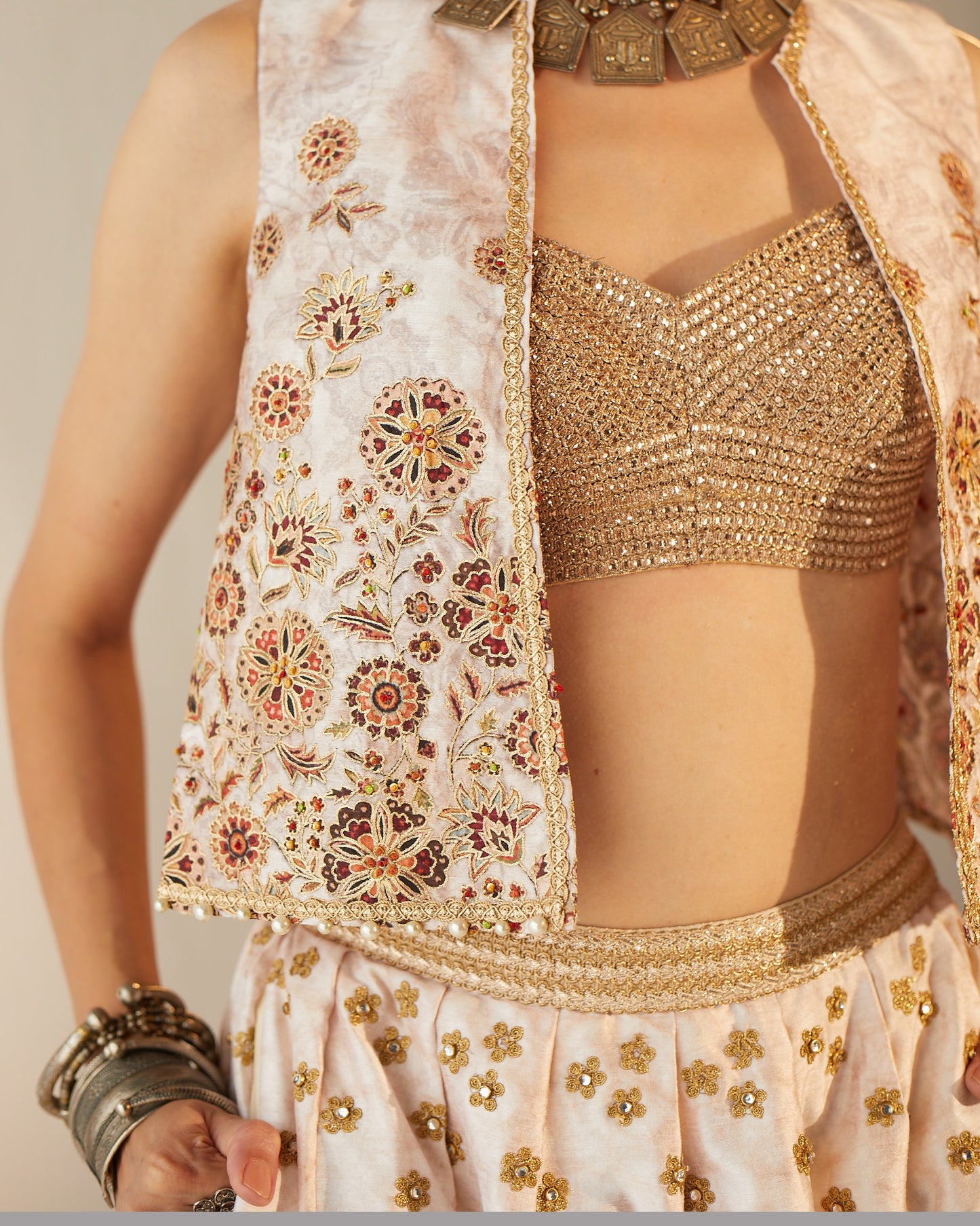 Floral spray lehenga with embroidered gilet