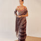 Organza saree with colored floral blouse