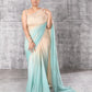 Ombré shaded georgette saree with gold corset blouse